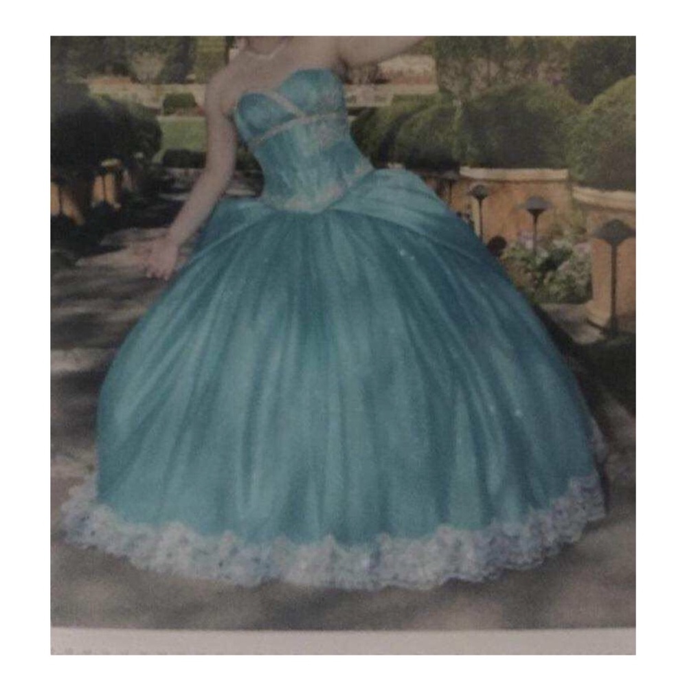 Aqua blue embroidered quinceañera dress